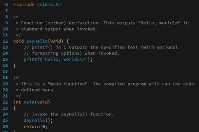 C programming language code with gray comment lines explaining the program, outputting 'Hello, world!' when executed.